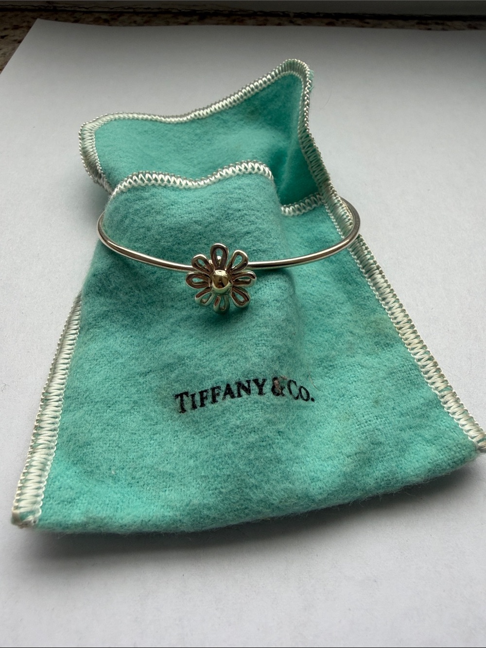 Tiffany & Co. Silver Daisy Bracelet with Gold Center and Signature Blue Pouch